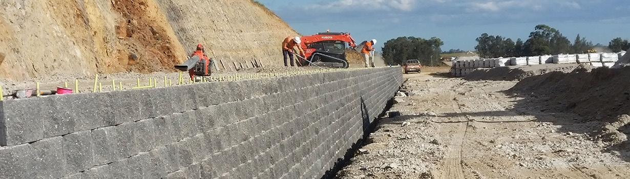 Concrete block retaining wall during earthworks construction