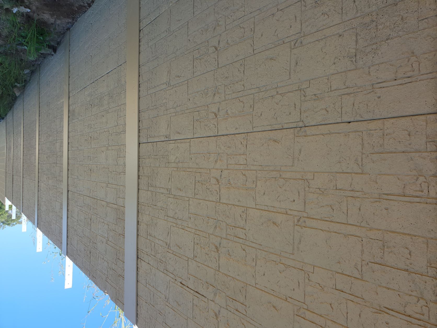 Painted concrete panels and posts