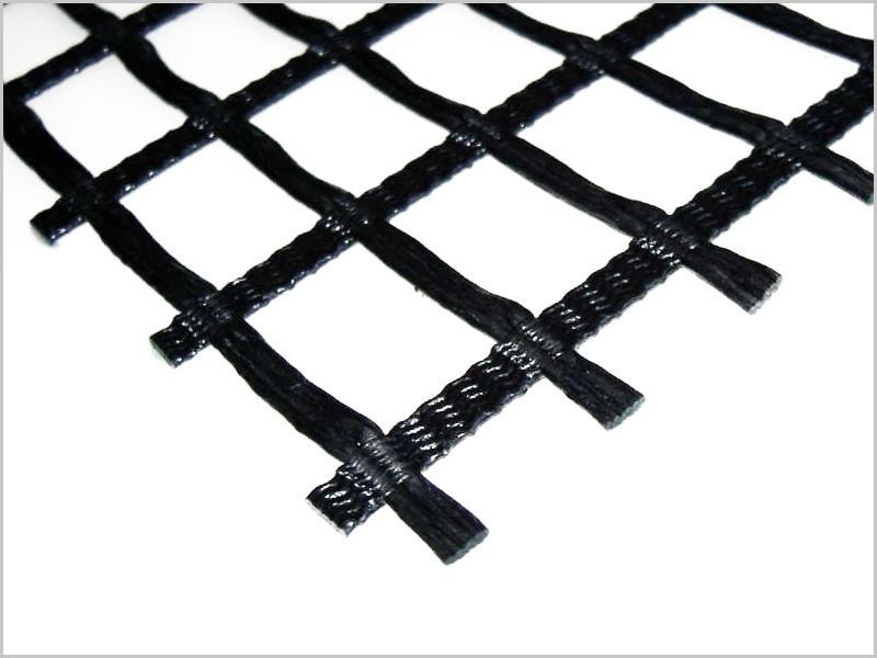 Close-up of the open grid structure of polymer geogrid