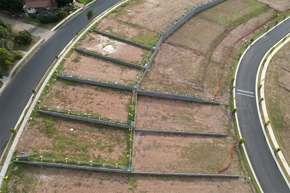 Rosemeadow Stage 3 — concrete panel retaining walls by Urbanscapes