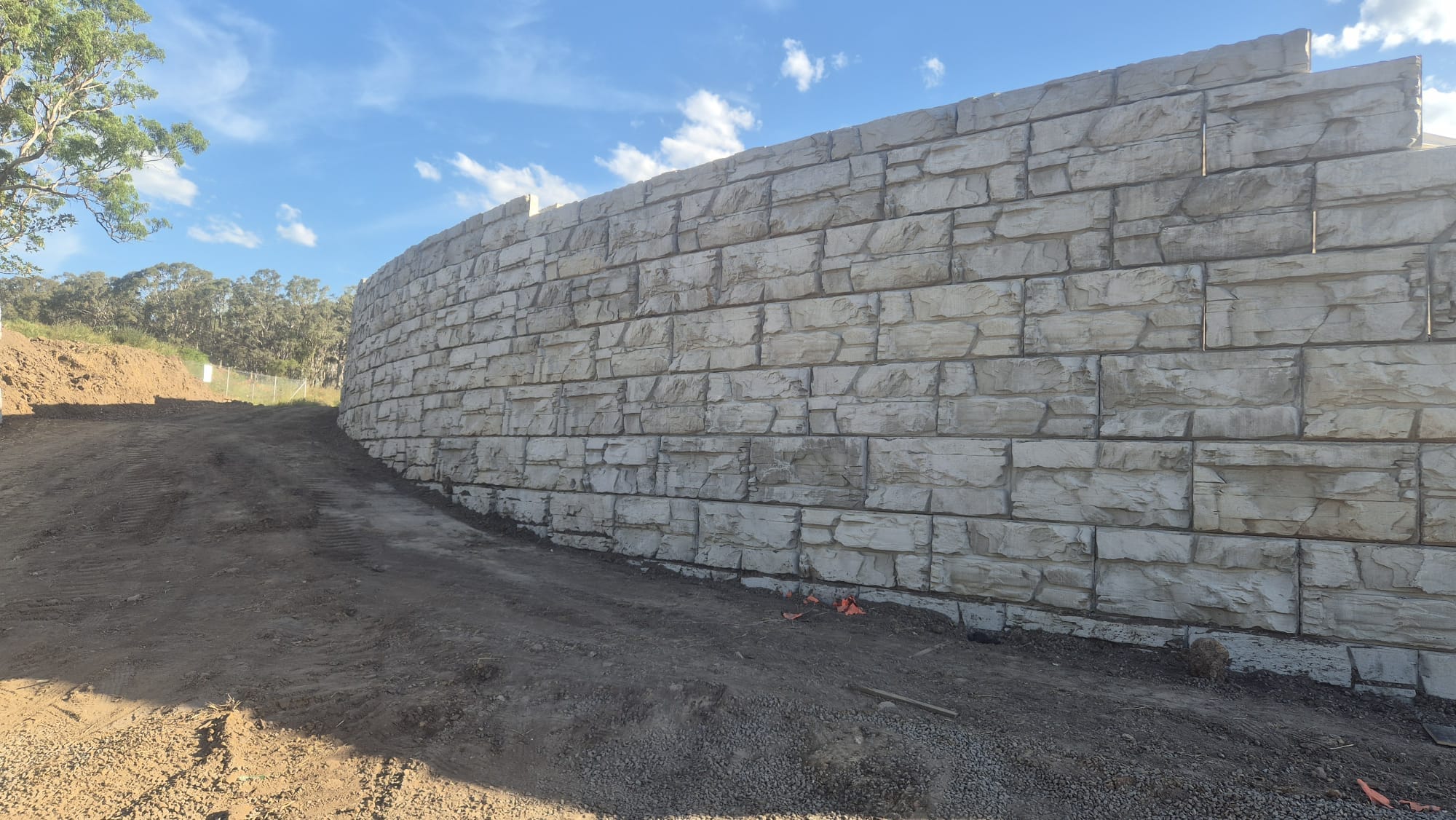 Curved interlocking block retaining wall on a development site