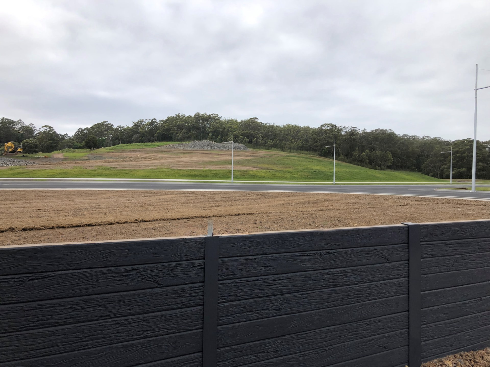 Painted concrete panels and posts 