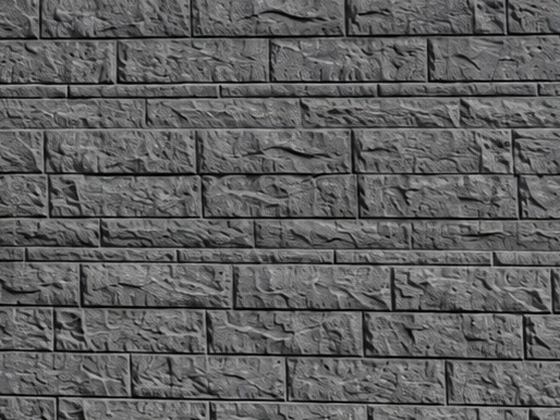 Splitface · Charcoal precast concrete panel finish